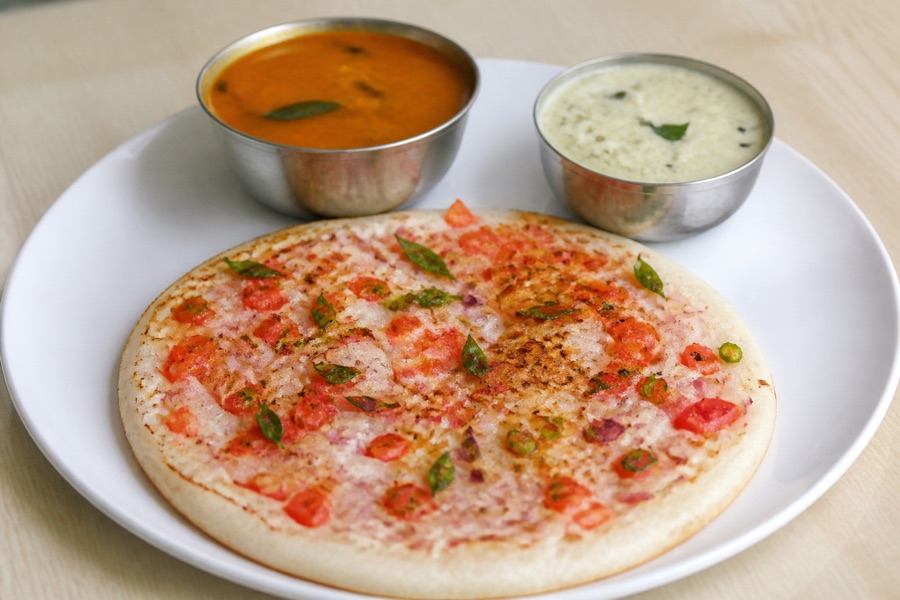 Uthappam breakfast with chutney and sambar